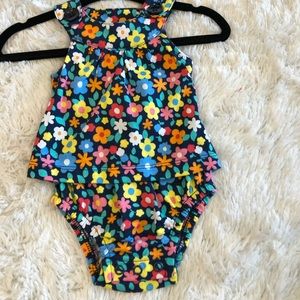 Newborn floral romper.NWOT